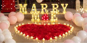 Carpet + Roses + Marry Me Sign